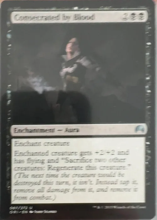 Out-of-focus card, rules text unreadable